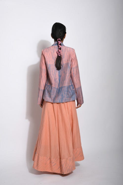 Coral silk jacket from Theloomart with a tailored fit, showcasing smooth fabric and elegant design.