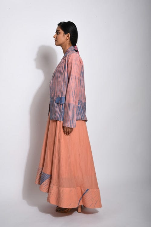 Coral silk jacket by Theloomart, showcasing smooth fabric and tailored fit, detailed with elegant stitching and a classic collar.