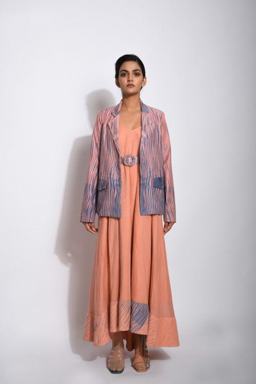Coral silk jacket by Theloomart, featuring a stylish design, smooth fabric, and elegant fit, shown on a model.
