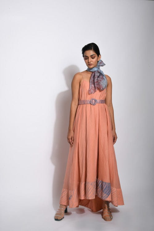 Salmon tan dress by Theloomart featuring a flowing fabric and elegant design, displayed on a hanger against a neutral background.