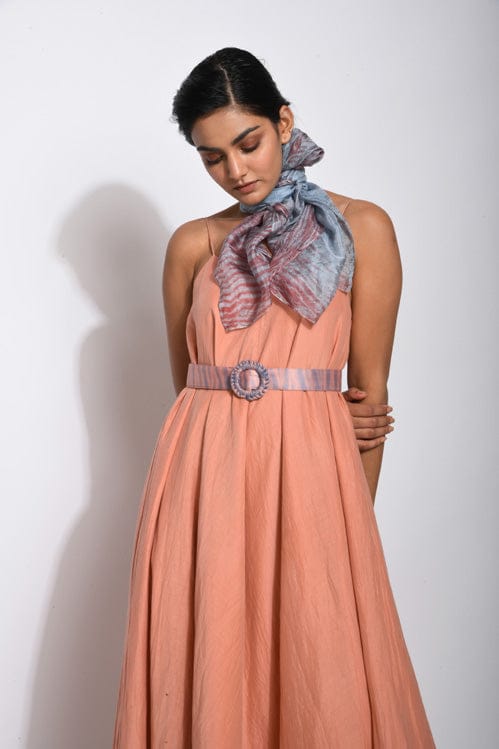 Salmon tan dress by Theloomart featuring a stylish, flowing design with long sleeves and elegant details.