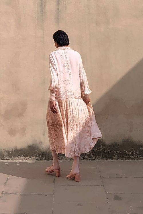Dreamy dusk dress by Theloomart featuring a flowing fabric with soft, elegant design and intricate detailing.