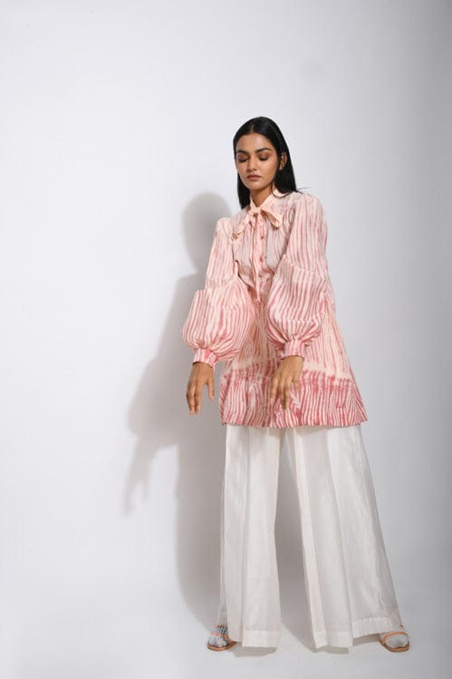 Ivory rose print shirt by Theloomart featuring a stylish, feminine top with floral design and lightweight fabric.