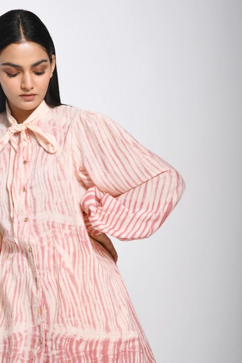 Ivory rose print shirt by Theloomart featuring a stylish, feminine top with floral design and lightweight fabric.