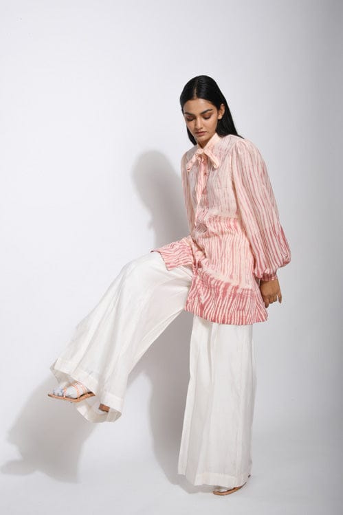 Ivory rose top shirt from Theloomart, featuring a soft fabric with floral rose embroidery and a relaxed fit.