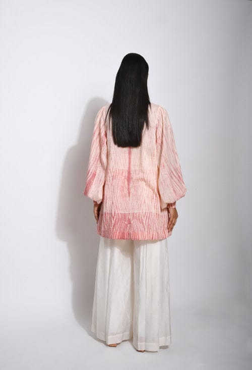 Ivory rose top shirt by Theloomart featuring floral embroidery and a relaxed fit, displayed on a hanger.