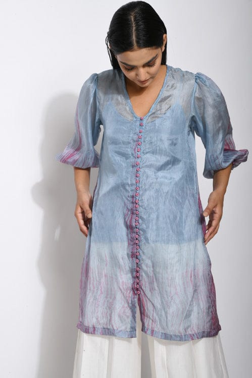Theloomart Marina Bay shirt featuring a stylish, patterned fabric with a classic collar and button-down front.