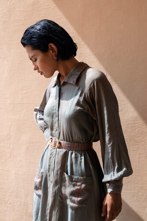 Camouflage dress by Theloomart featuring a stylish, fitted design with a camouflage pattern and short sleeves.