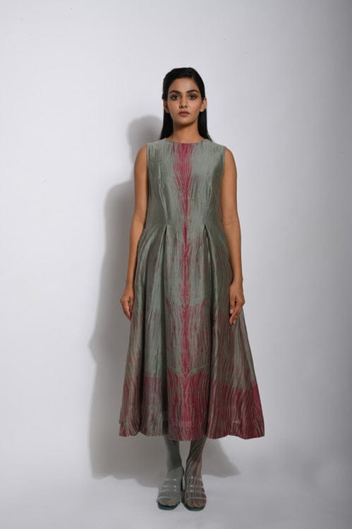 Theloomart Pickle & Wine dress with a vibrant, colorful pattern and flowing fabric, stylishly displayed on a hanger.