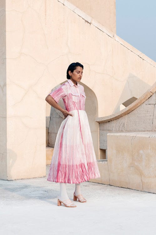 Coral-colored Theloomart dress with flowing fabric and sleeveless design, perfect for casual or semi-formal occasions.