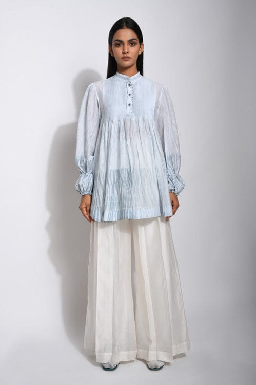 Vanilla Sky shirt by Theloomart displayed on a hanger, showcasing lightweight fabric and casual style.