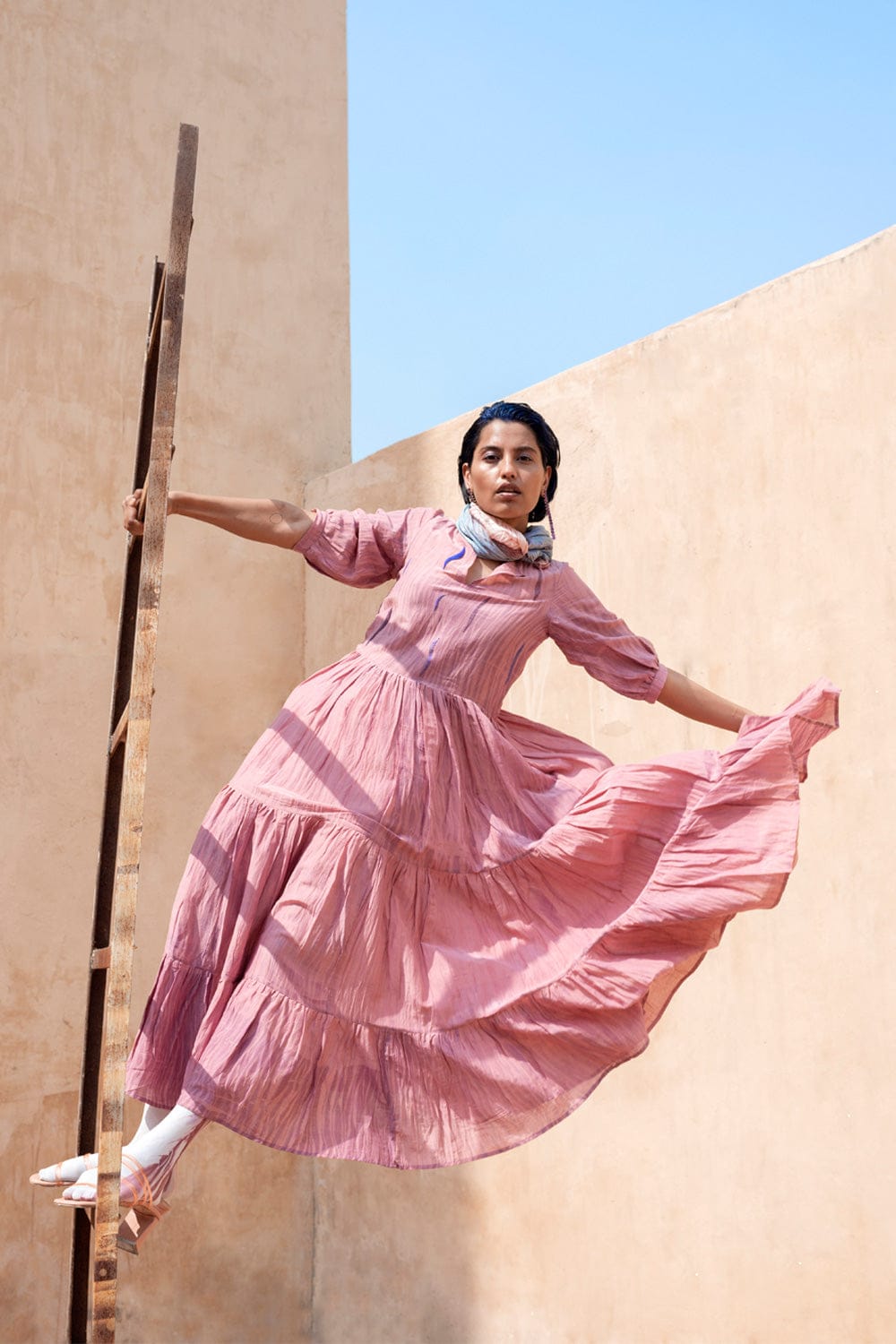 Cannon silk dress by Theloomart featuring a flowing design, soft silk fabric, and elegant silhouette suitable for special occasions.