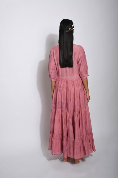 Elegant Cannon silk dress by Theloomart featuring a flowing design and intricate details in soft silk fabric.