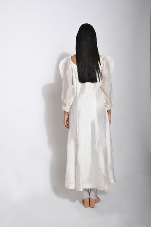 Pearl white silk dress by Theloomart featuring elegant fabric and a flowing silhouette, perfect for formal occasions.