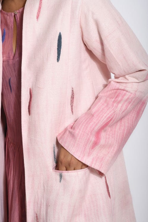 Coral Haze jacket by Theloomart, featuring a stylish, lightweight design with vibrant coral color and casual fit.
