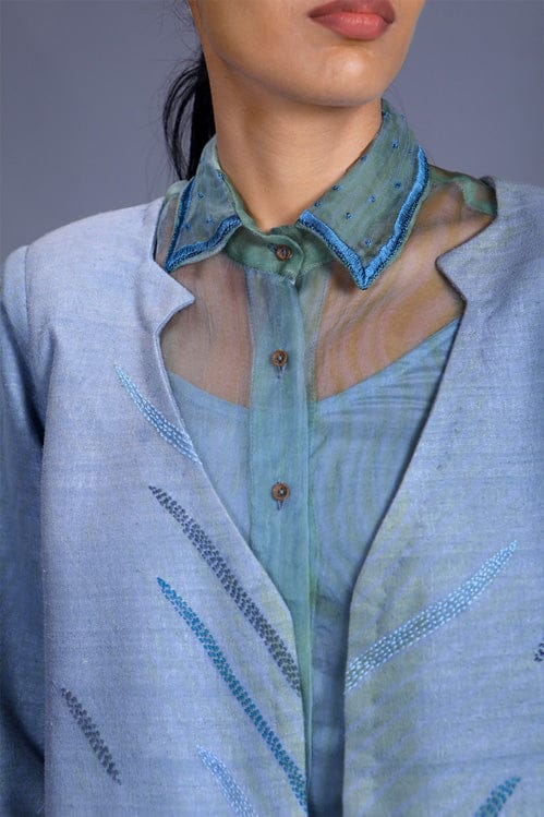 Flora & Fauna jacket by Theloomart featuring a vibrant botanical print and lightweight fabric, perfect for casual wear.