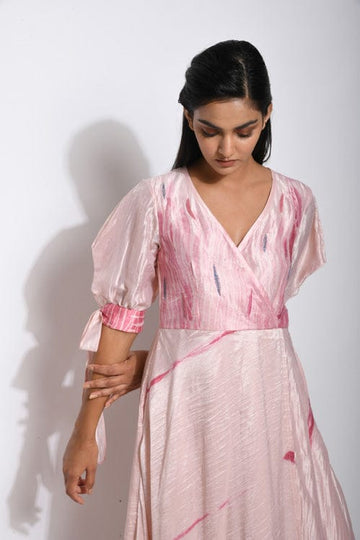 Elegant rose punch dress by Theloomart featuring a flowing fabric and floral design, perfect for special occasions.