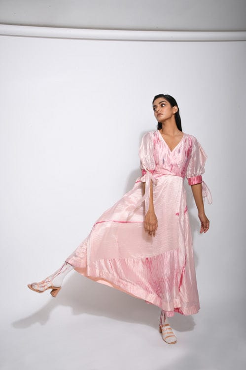 Elegant rose punch dress by Theloomart featuring a flowing design with floral accents and a stylish silhouette.