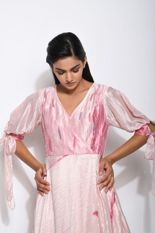 Elegant rose punch dress by Theloomart featuring floral design, flowing fabric, and stylish fit for special occasions.