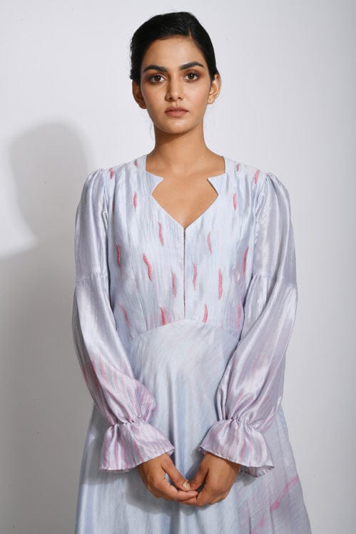 Elegant Persian silk dress by Theloomart featuring intricate patterns and flowing fabric, perfect for formal occasions.