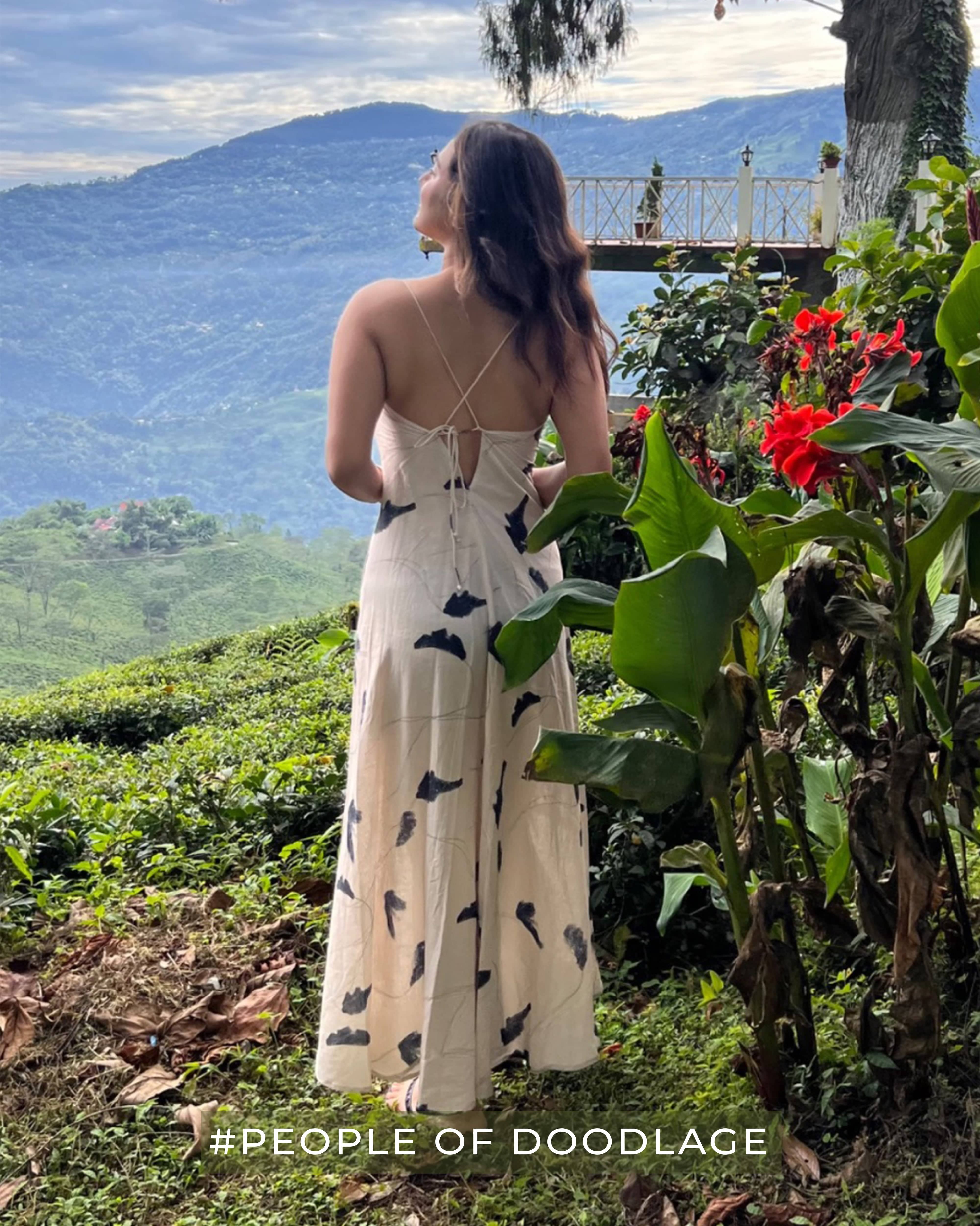 Doodlage Lola printed dress with colorful floral pattern, knee-length design, and short sleeves, perfect for casual occasions.
