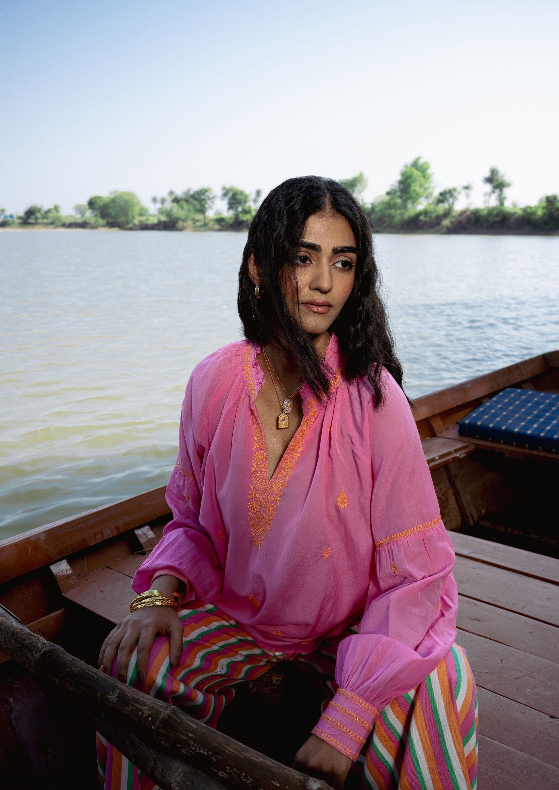 Elegant Mahal Blouse Chikankari top from The Raw India featuring intricate hand-stitched floral embroidery on soft fabric.