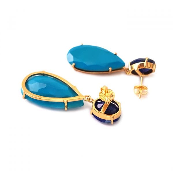 Bombaybirds Mo'orea earrings featuring blue tear-drop design with gold-tone hooks, showcasing elegant jewelry style.