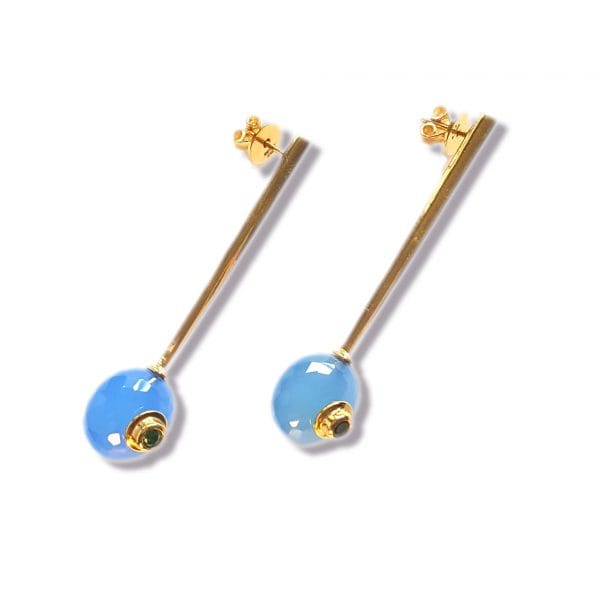 Gold Naya earrings by Bombaybirds featuring intricate design and elegant dangle style on a white background.