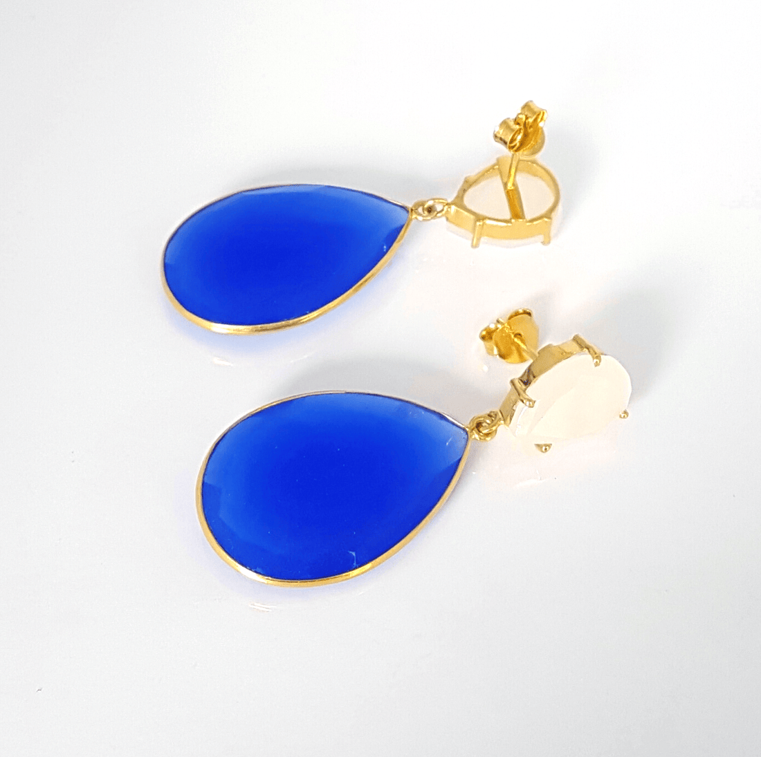 Blue Nella earrings by Bombaybirds featuring elegant dangle design and intricate detailing for stylish wear.