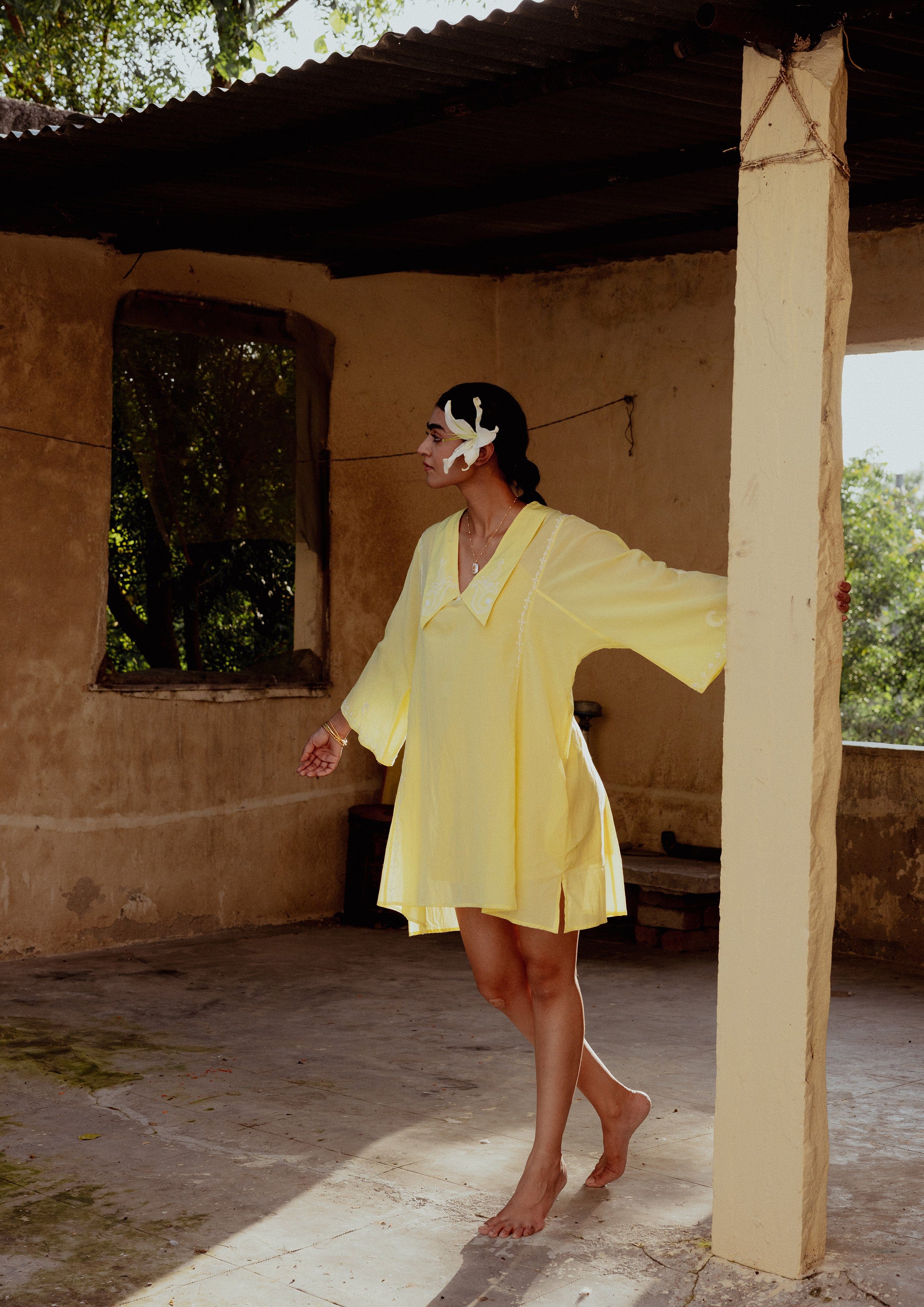 Elegant Noor Kaftan dress with intricate Chikankari embroidery by The Raw India, shown in a flowing, traditional design.