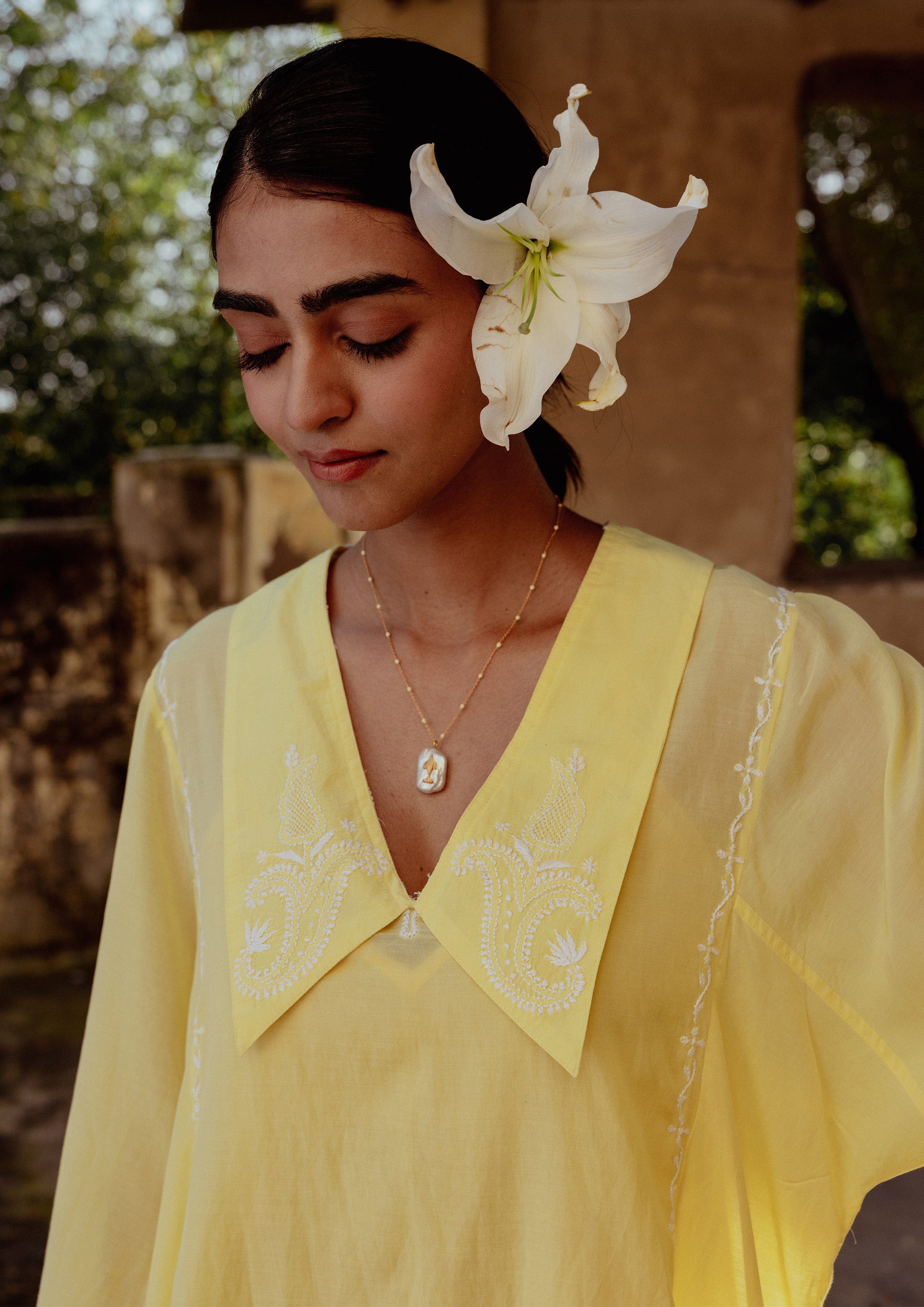 Elegant Noor Kaftan Chikankari dress by The Raw India, featuring intricate hand embroidery and flowing fabric.
