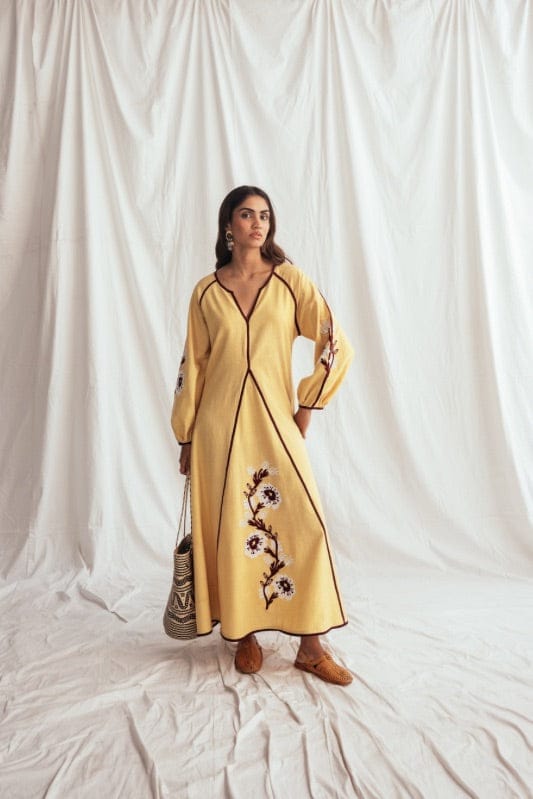 JODI Aamras handloom peasant dress with vibrant traditional patterns and relaxed fit, perfect for casual wear.