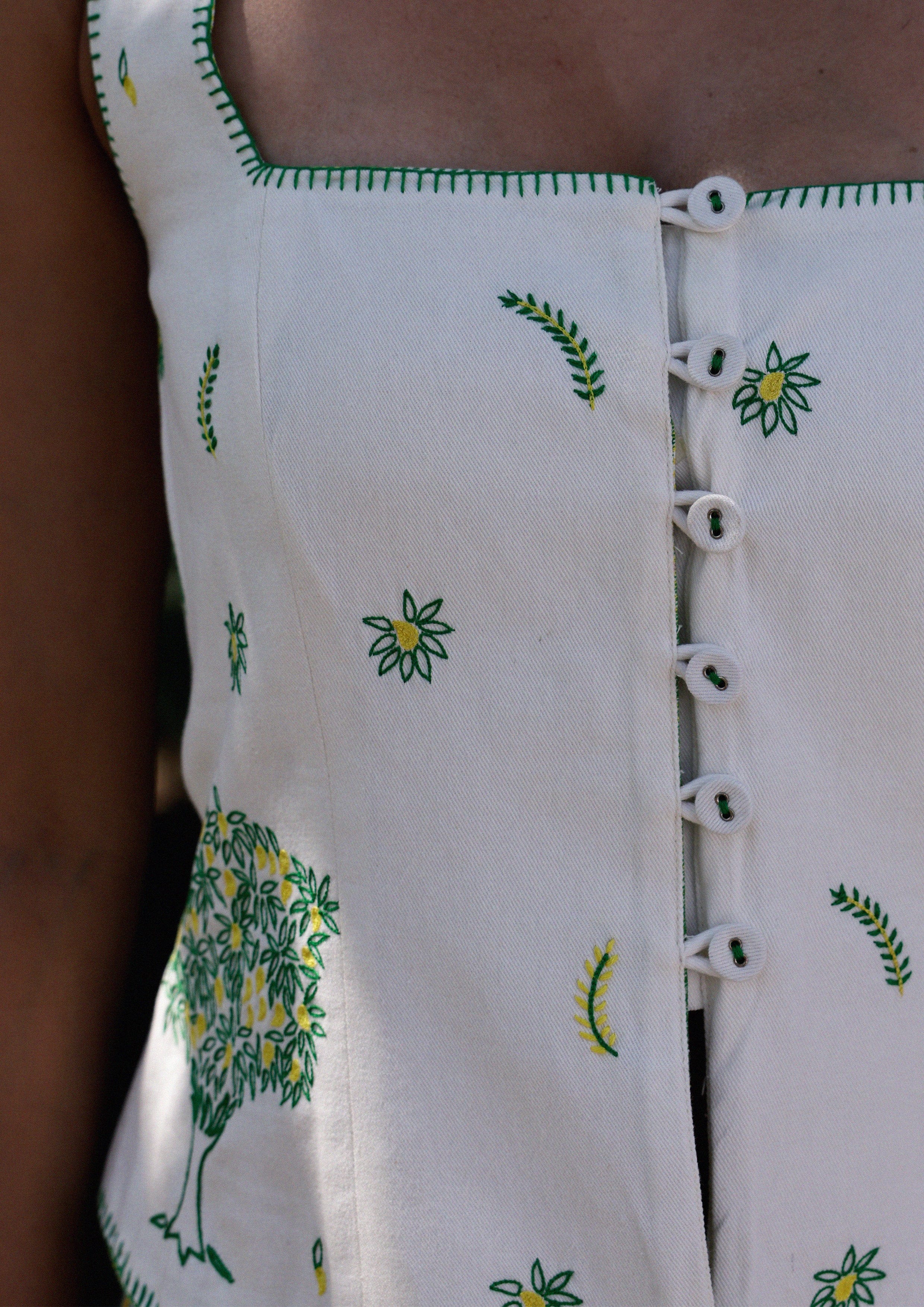 Mango and crane embroidery Palash vest from The Raw India, featuring intricate traditional design on stylish top.