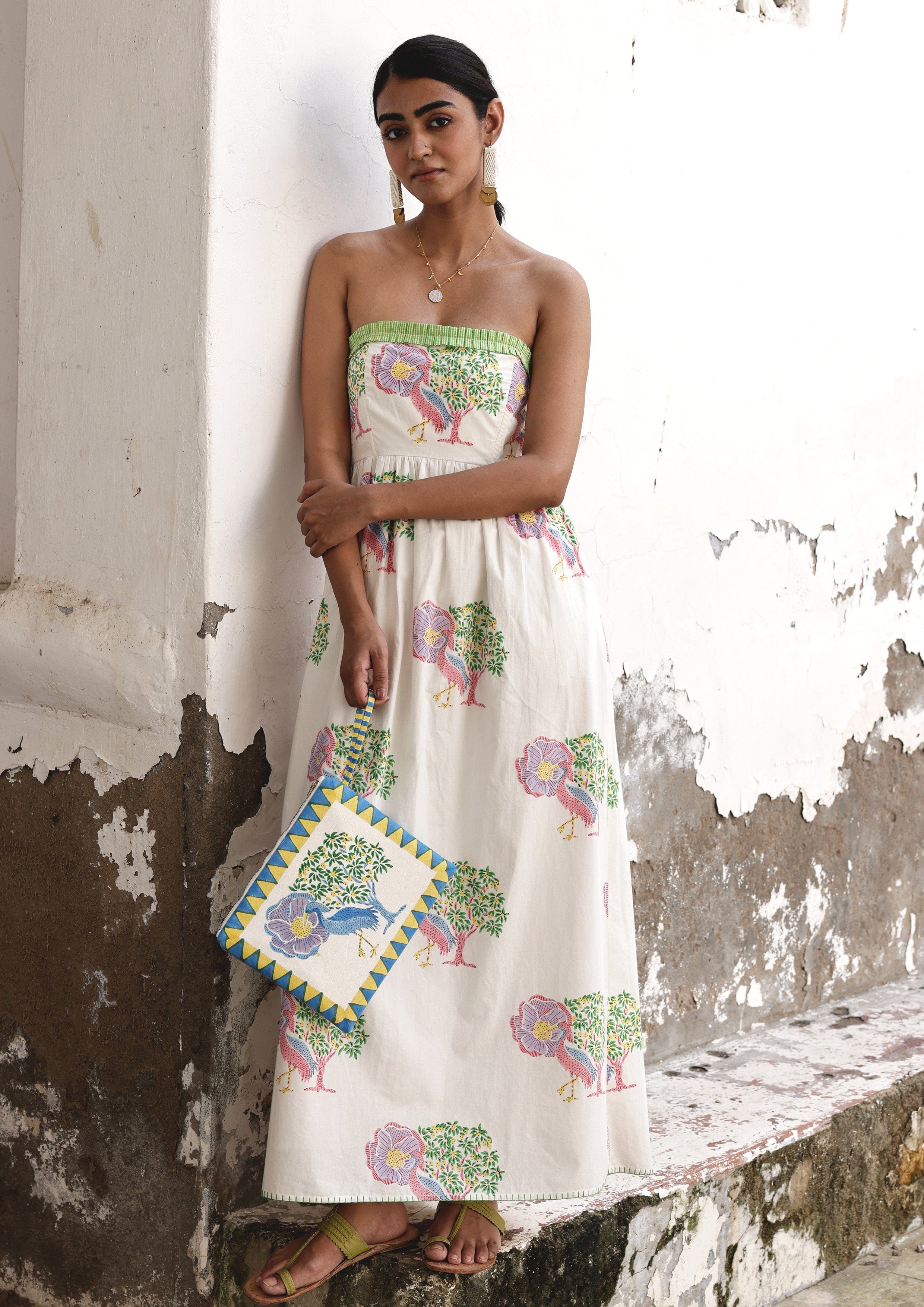 The Raw India Saras Crane pouch bag with intricate design and vibrant colors, showcasing traditional craftsmanship.