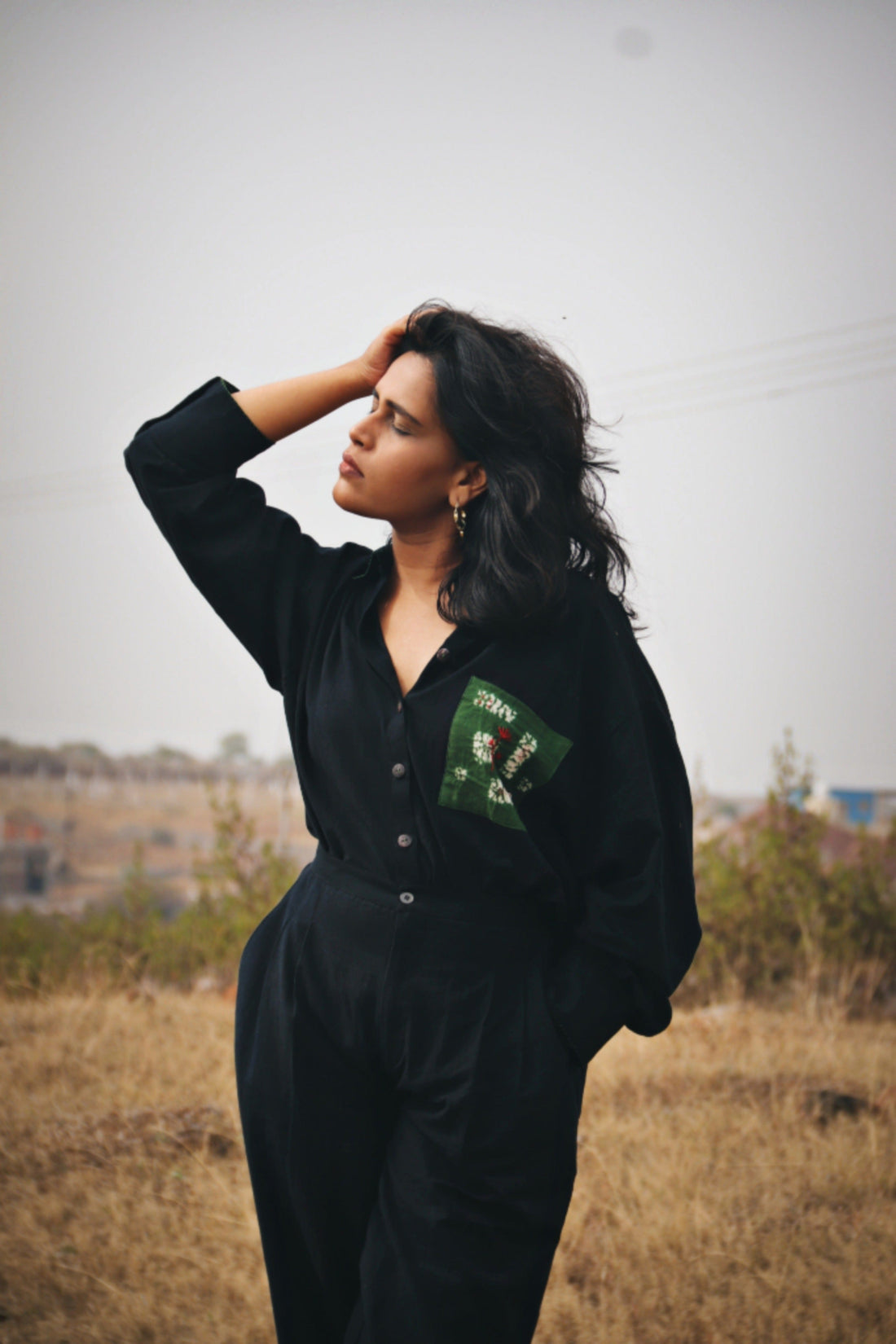 Deeta Kai black co-ord set featuring a matching top and pants with a stylish, fitted design and comfortable fabric.