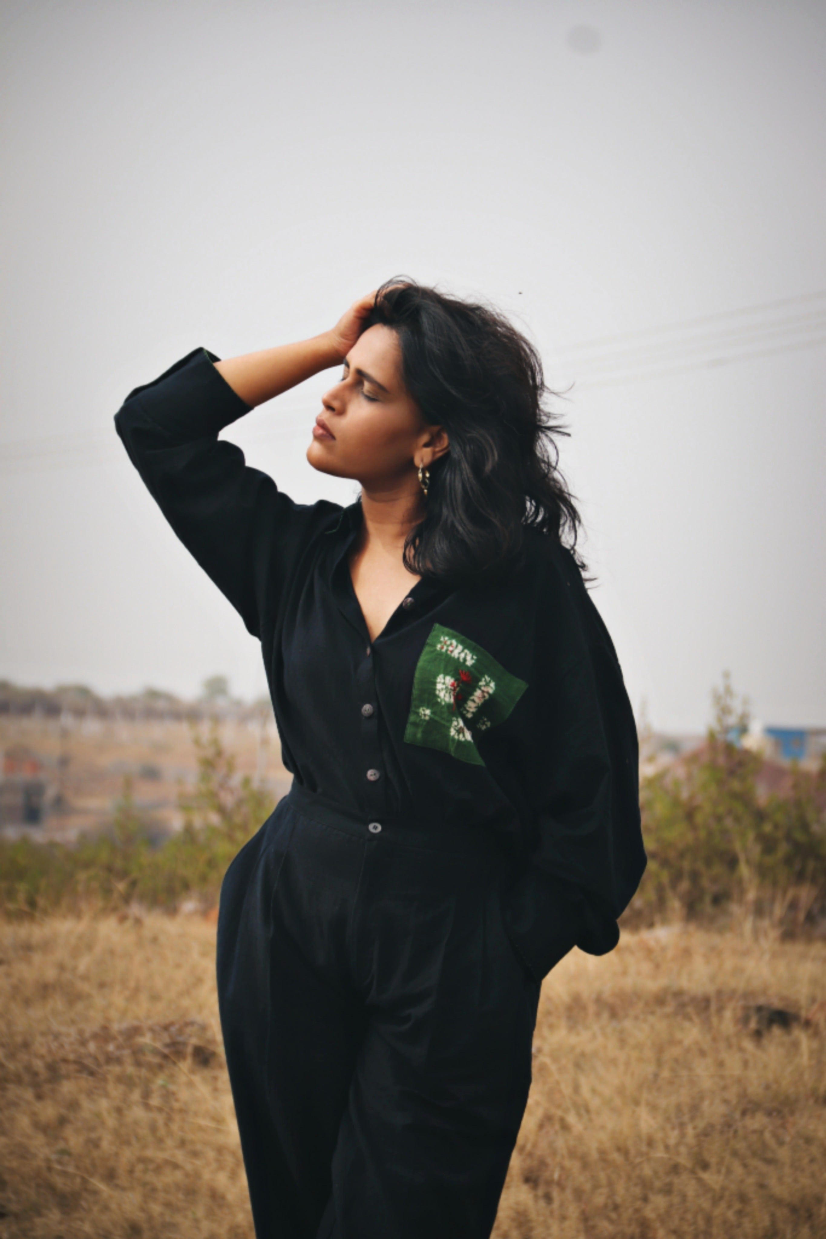 Deeta Kai black co-ord set featuring a matching top and pants with a stylish, fitted design and comfortable fabric.