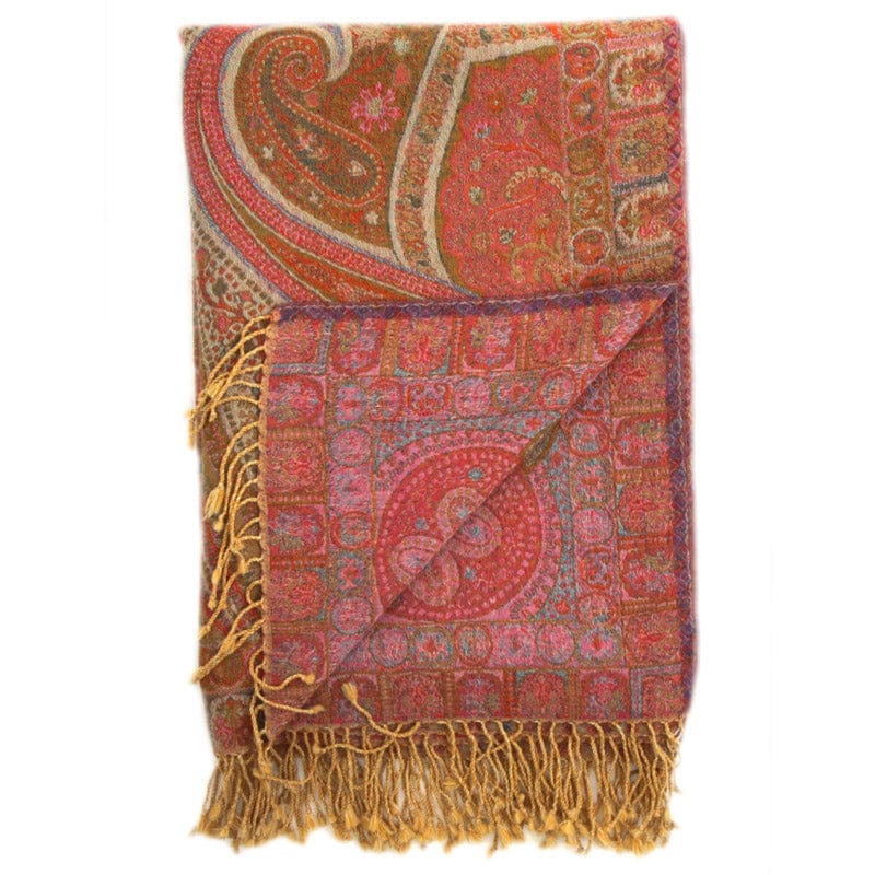 Pink Kyri throw blanket from Bombaybirds, cozy living room accessory with soft, vibrant pink fabric and textured design.