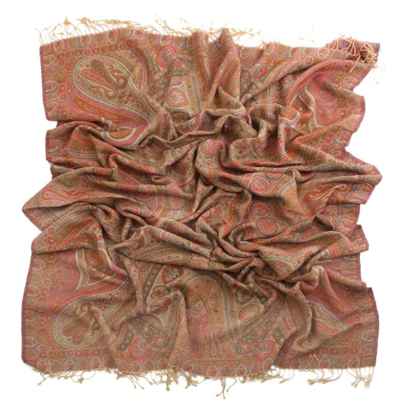 Pink Kyri throw blanket from Bombaybirds, soft and cozy living room accessory with a vibrant pink color and plush texture.