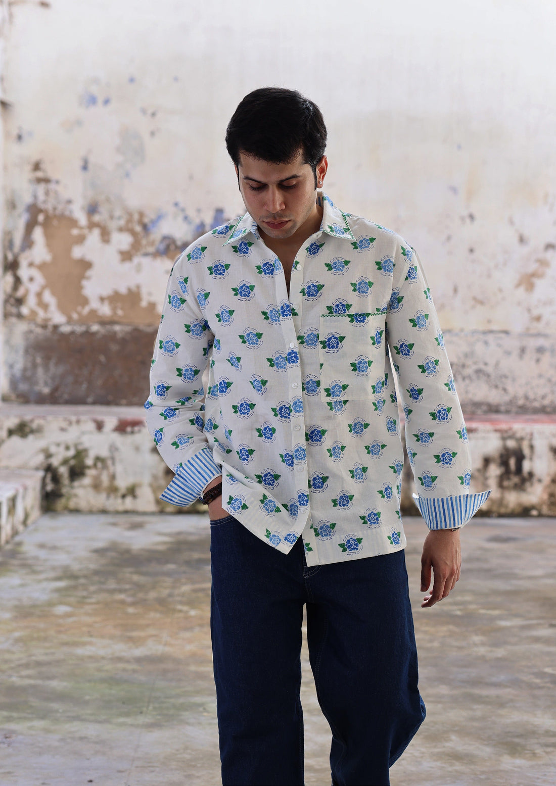 Blue Sawai shirt by The Raw India featuring a marigold pattern, made from soft, breathable fabric for comfortable wear.