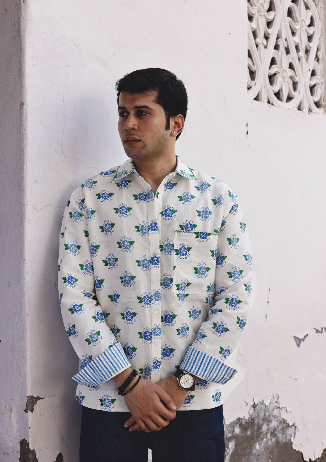 Blue Sawai shirt by The Raw India featuring a marigold pattern, made from soft, breathable fabric for comfortable wear.