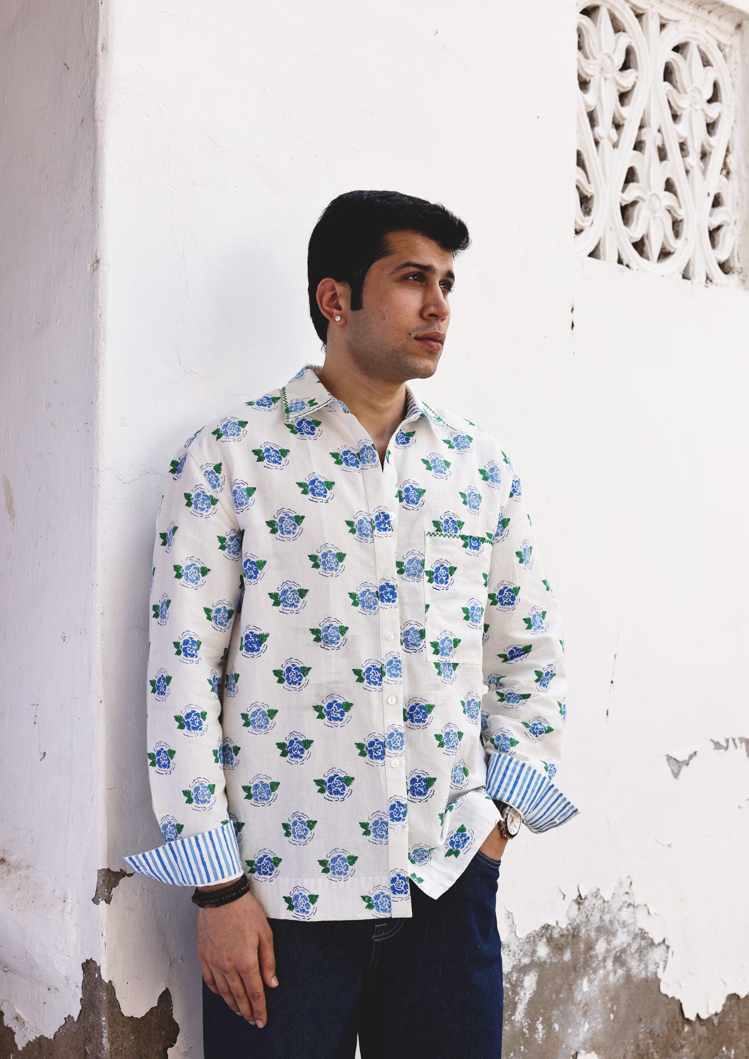 Blue Sawai shirt from The Raw India featuring marigold accents, stylish top made from comfortable fabric.
