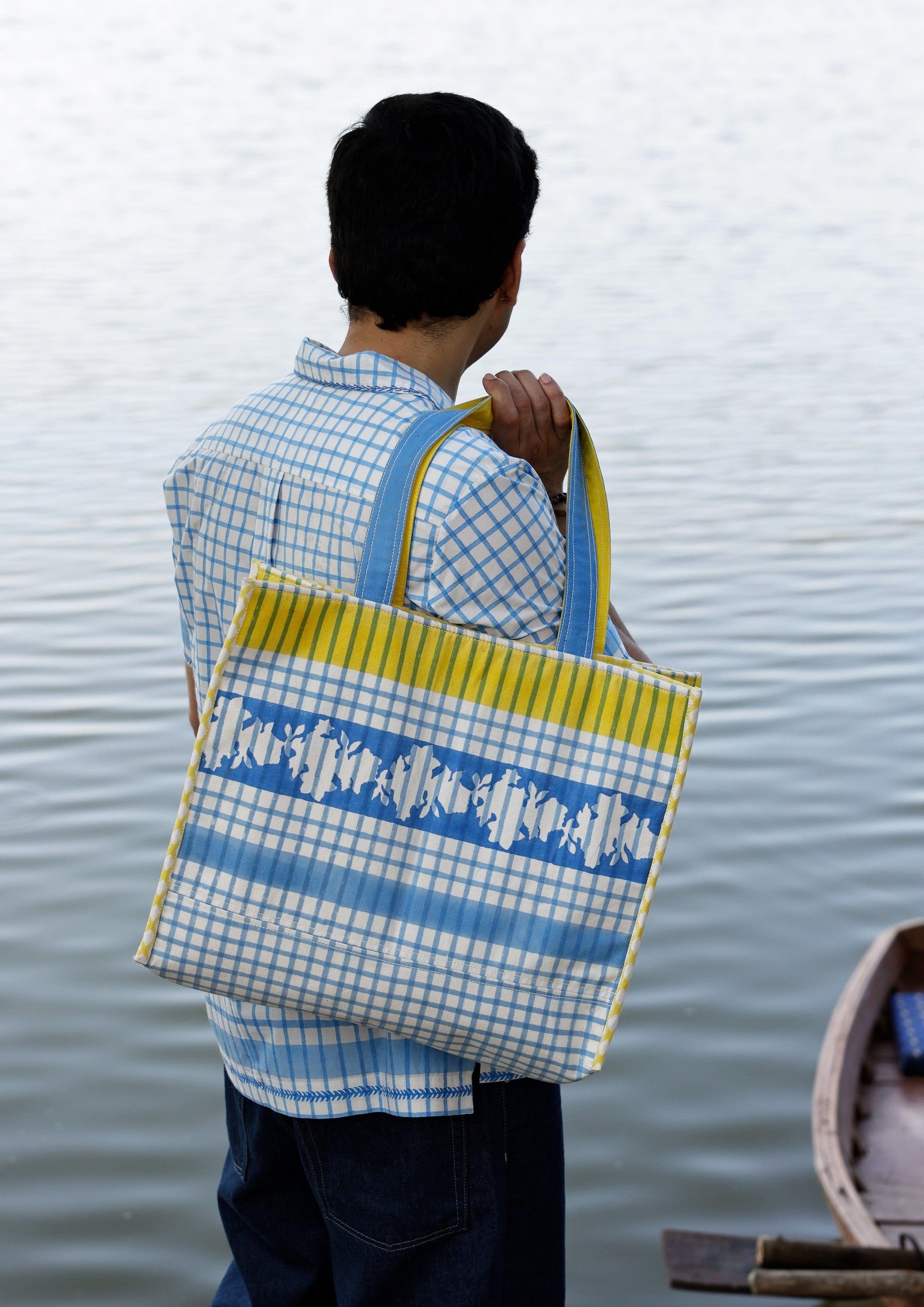 Blue checks tote bag from The Raw India featuring durable fabric and stylish design, perfect for everyday use.