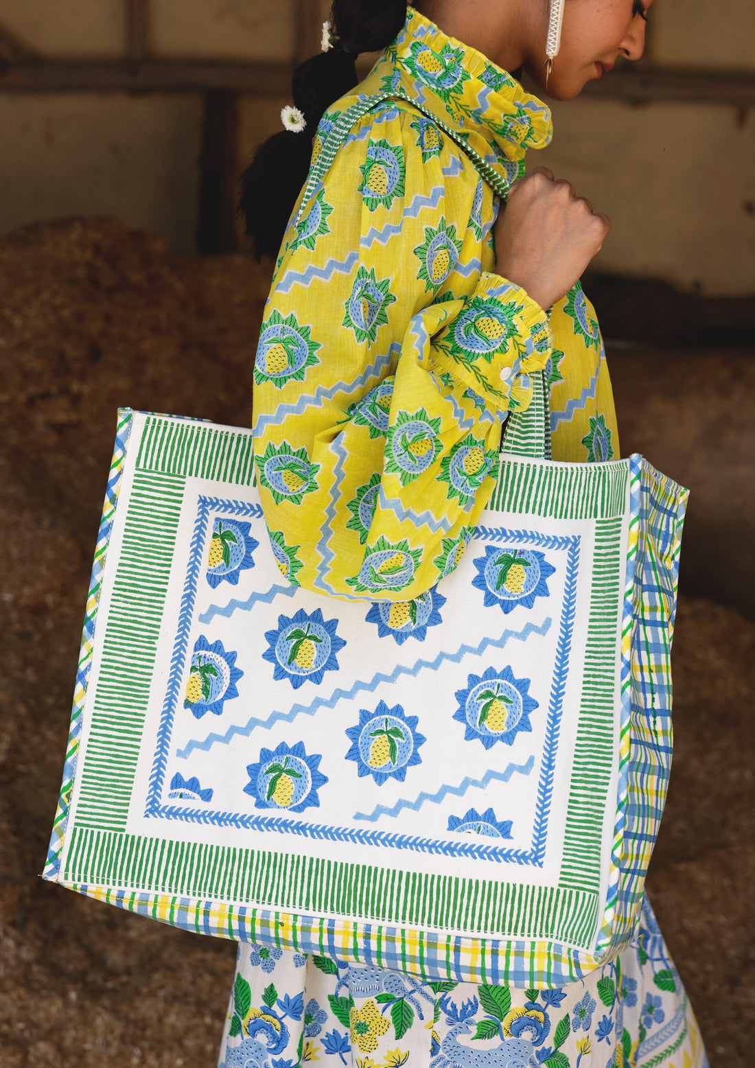 Mango block print tote bag by The Raw India, stylish cotton bag with vibrant traditional design and sturdy handles.