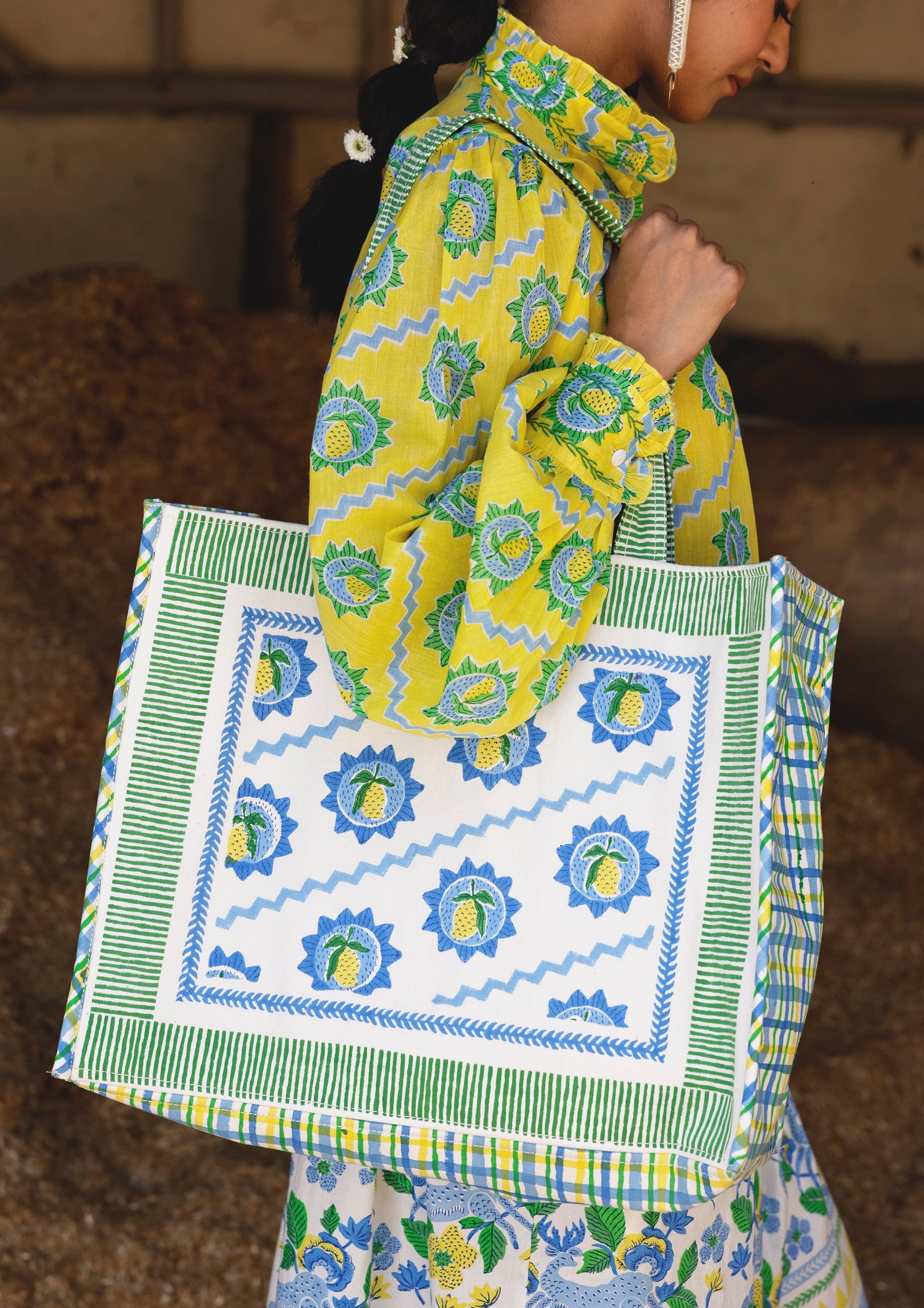 Mango block print tote bag by The Raw India, stylish cotton bag with vibrant traditional design and sturdy handles.