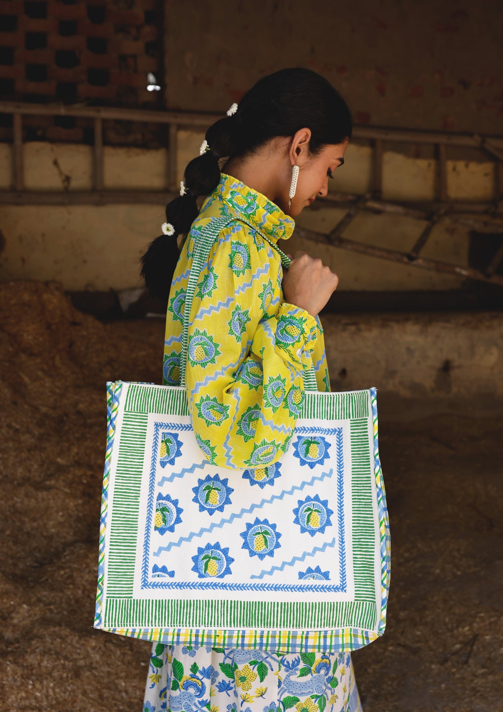 Mango block print tote bag by The Raw India, stylish cotton bag with vibrant traditional pattern and sturdy handles.
