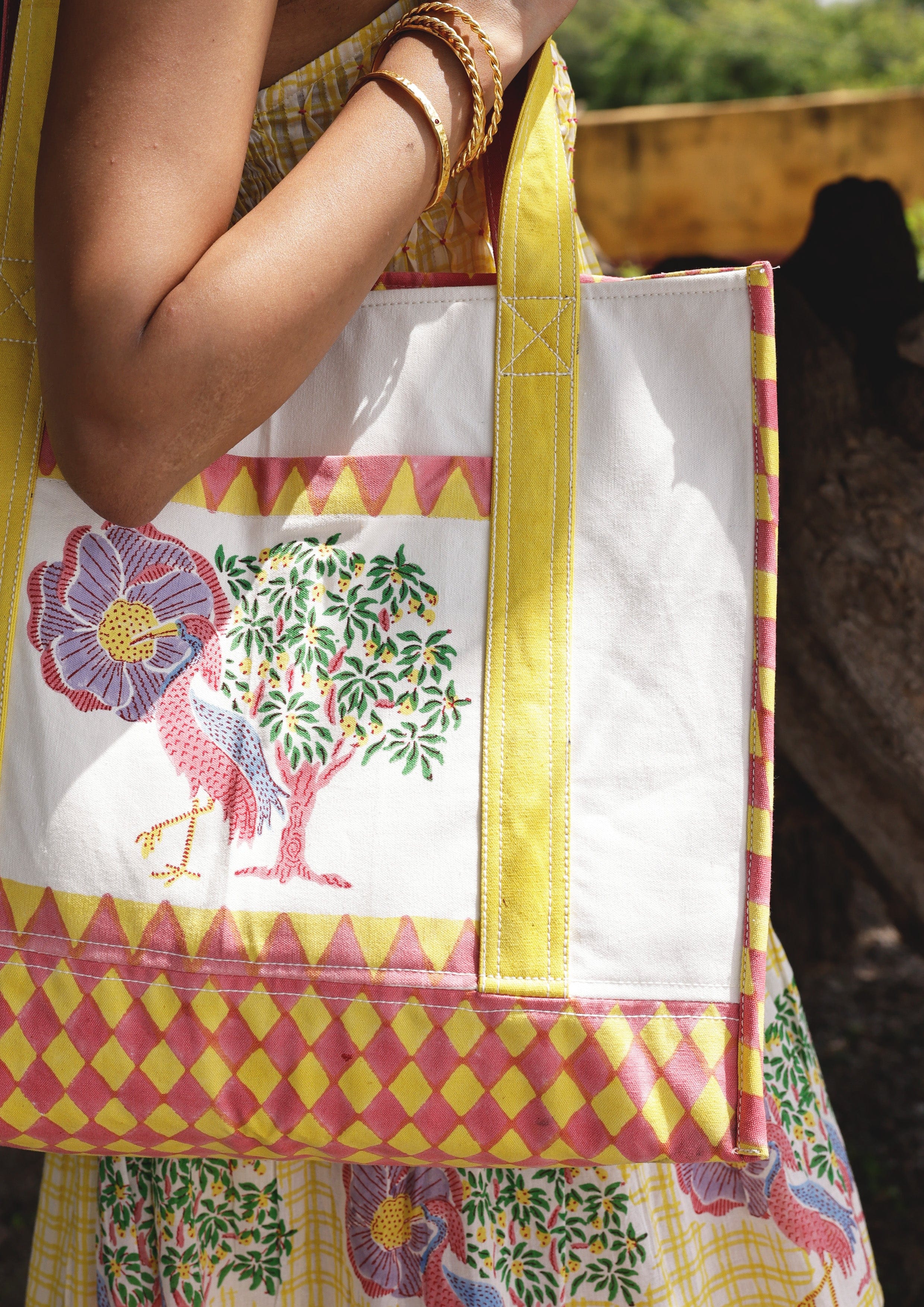 The Raw India tote bag featuring a Saras Crane design with vibrant colors and sturdy fabric, perfect for everyday use.