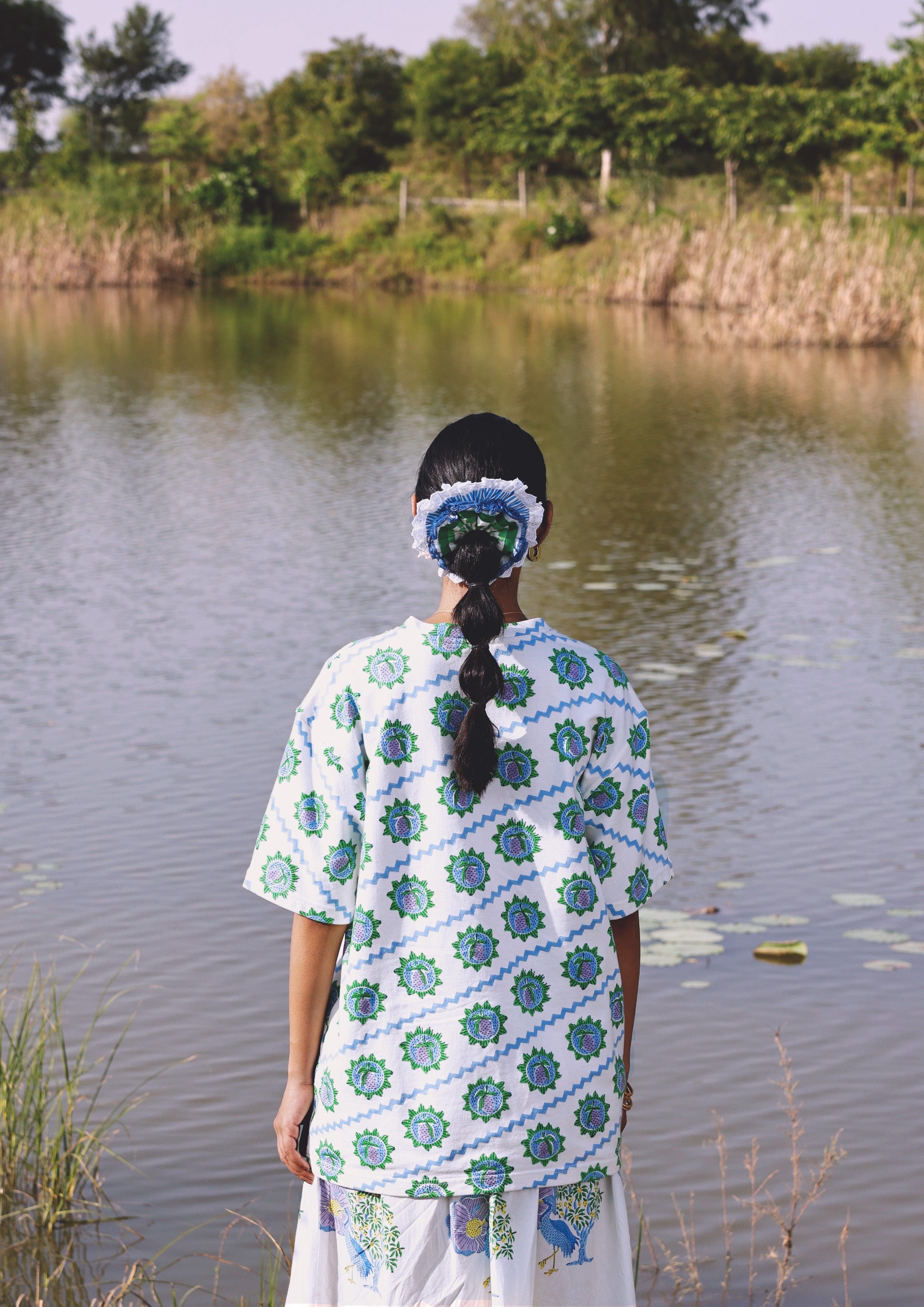 Blue Mango T-shirt from The Raw India, casual top with a relaxed fit, featuring a simple crew neckline and soft fabric.