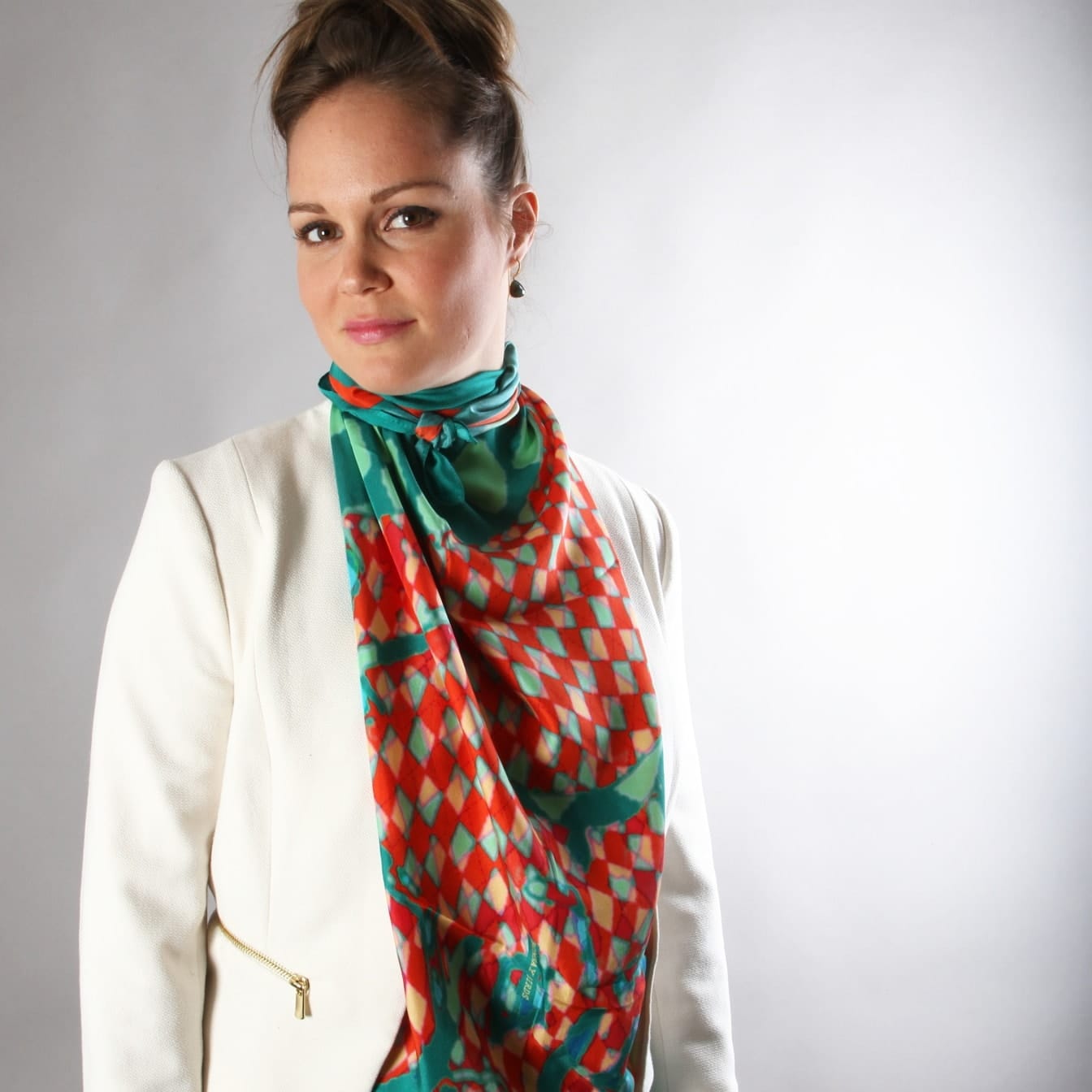 Elegant silk scarf featuring the enchanted swan design by Bombaybirds, showcasing intricate patterns and vibrant colors.