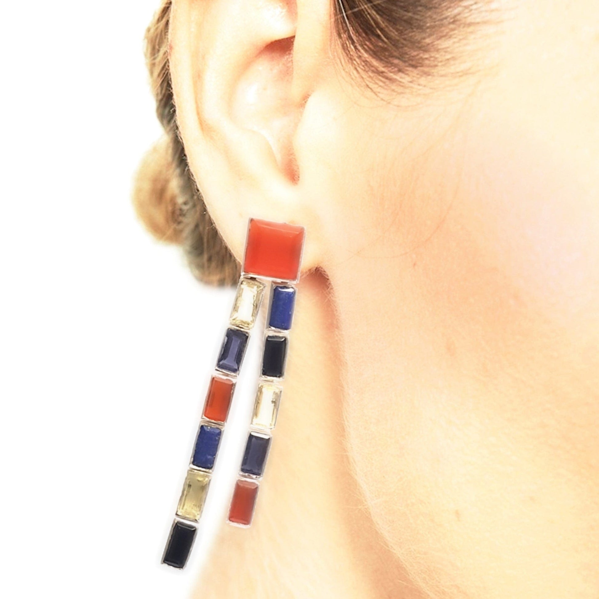 Bombaybirds Adela chandelier earrings featuring intricate designs with dangling elements and elegant craftsmanship.