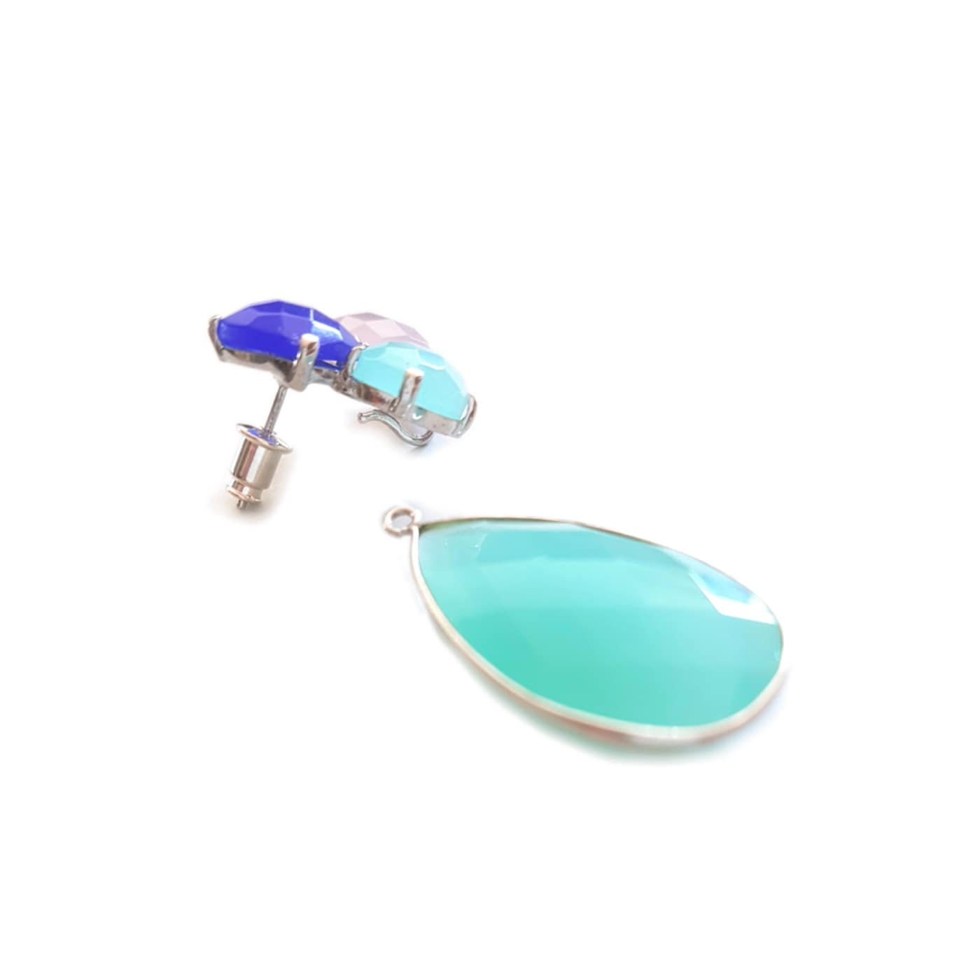 A pair of Vivana removable earrings by Bombaybirds featuring aqua blue drop design with flexible, detachable dangles.